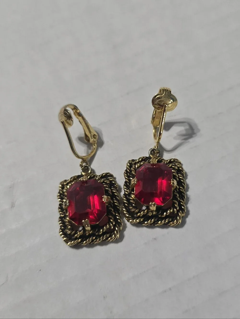 Sarah Coventry Majorca Red Gemstone Gold Tone Scroll Pattern Clip On Earrings
